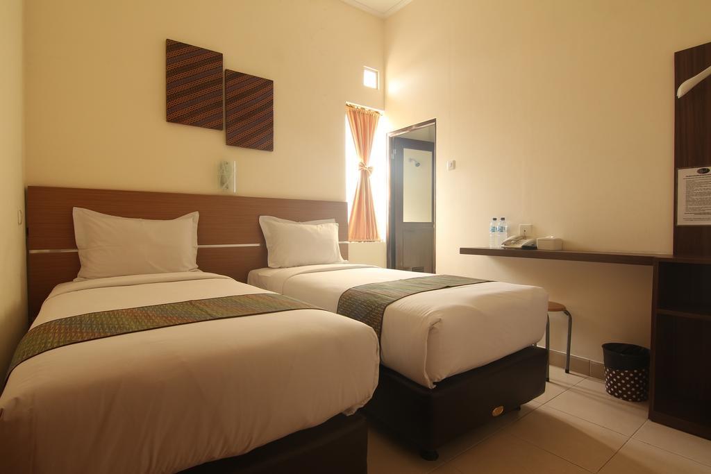 Hotel Pules Джокьякарта Номер фото